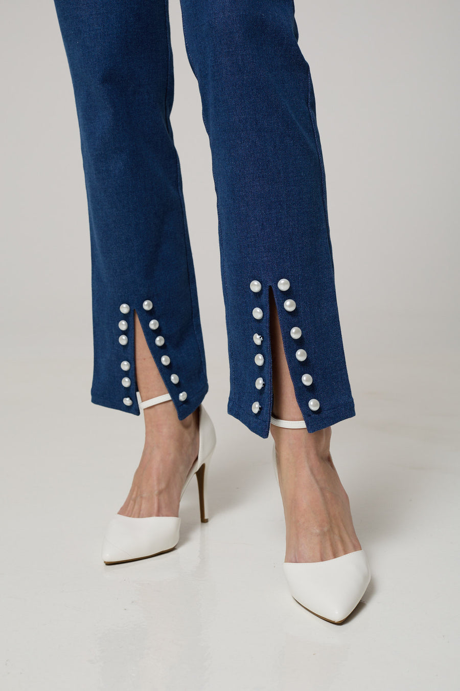 High-Waisted Button-Front Denim Jeans with Slit and Pearl Detailing